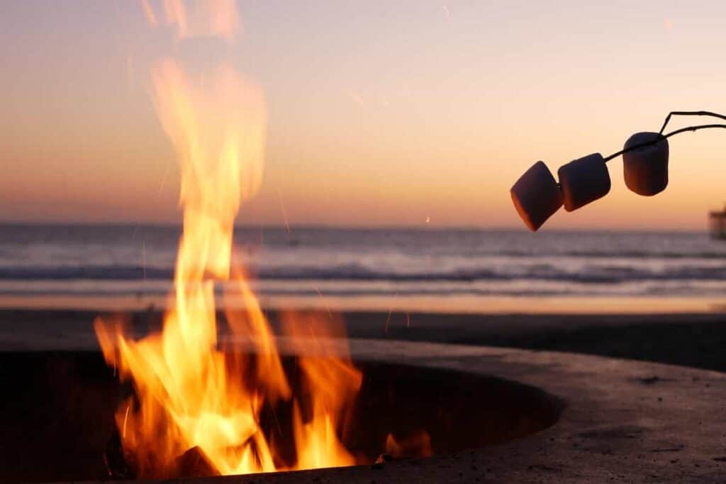 A fire ring comes in handy for grilling marshmallows on the beach, How to Grill on The Beach: Surprising [Simple Methods] To Prepare Food For Your Beach BBQ, grilling on the beach, how to grill on the beach, can you cook on the beach, can i grill on the beach, can you grill on the beach, grill on the beach, how to grill on the beach
