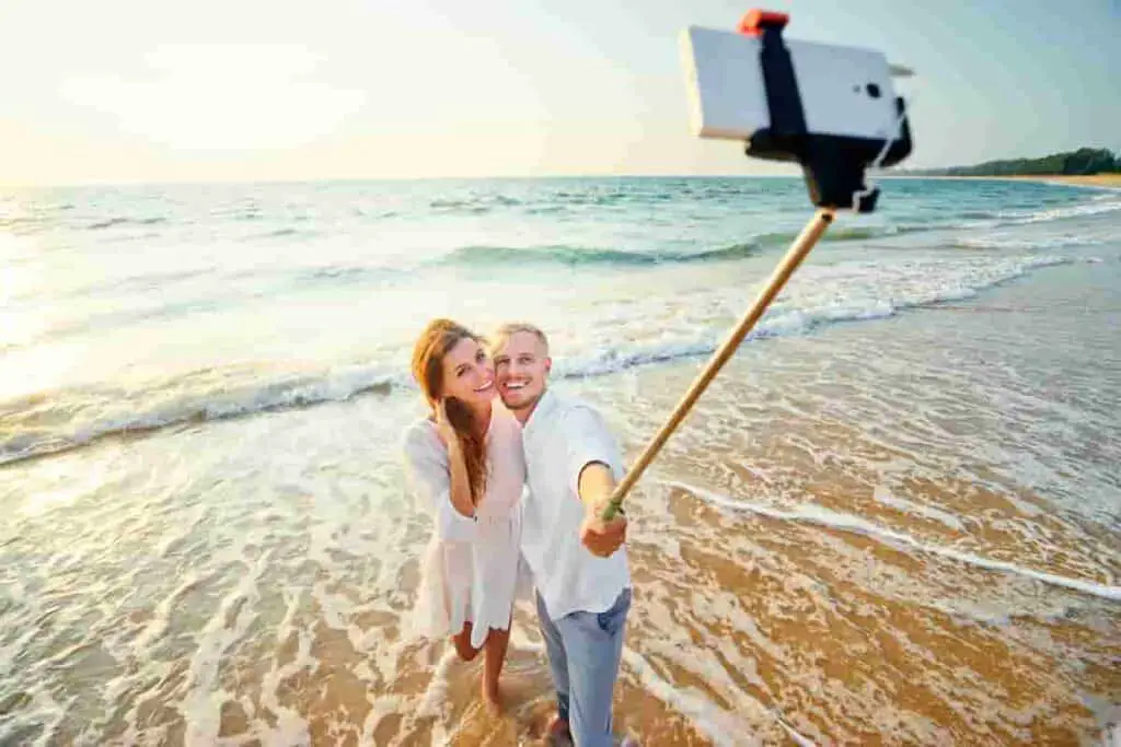 Use a selfie stick to take great pictures of yourself at the beach