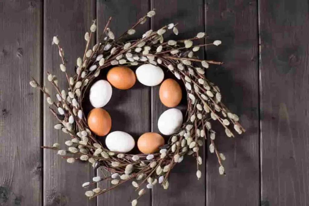 a spring wreath to hang on your door complete with eggs and branches