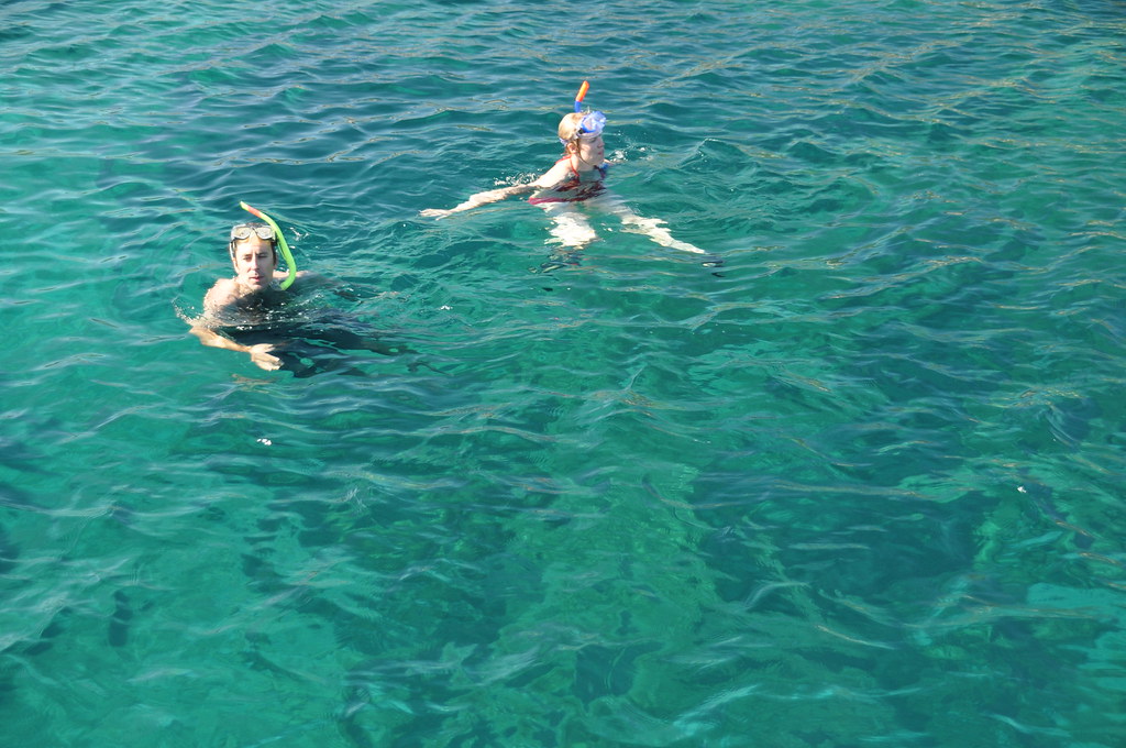 Kids snorkeling in blue green sea, Best Snorkeling for Families- Amazing Travel Destinations [Beaches, Beginners, Caribbean], best places to snorkel, places for snorkeling in Croatia, best snorkeling in Europe, family snorkeling, best snorkeling places in Croatia, best snorkeling for families, best snorkelling holidays for families